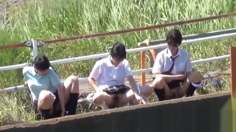 Teenage asians urinating