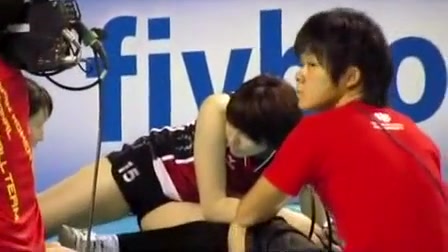 Asian volleyball girls stretch before a match