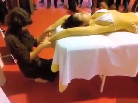 Double massage in public of an Asian bikini girl