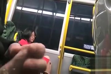 Dude beats off on a lovely Asian lady in the train