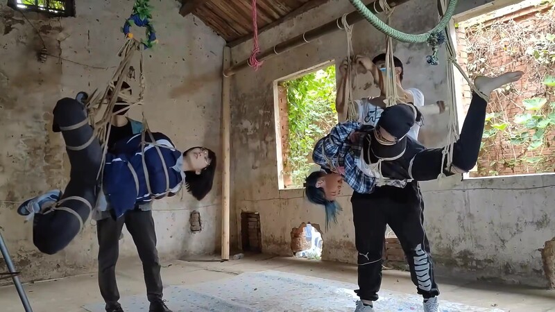 Two Girls Suspended In An Abandoned House